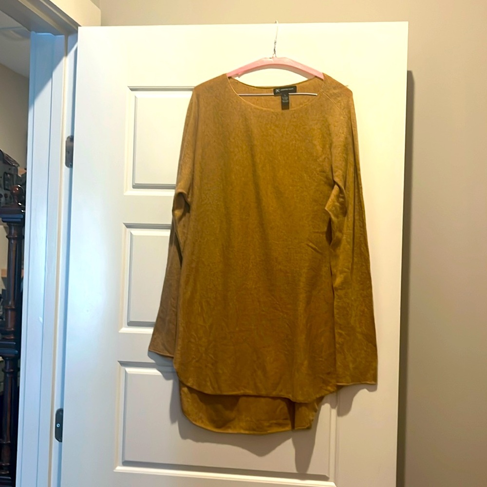 Long, tan sweater